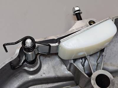 1977_sportster_primary_chain_adjuster_shoe_upgrade_kit_pic4_by_fizzle.jpg